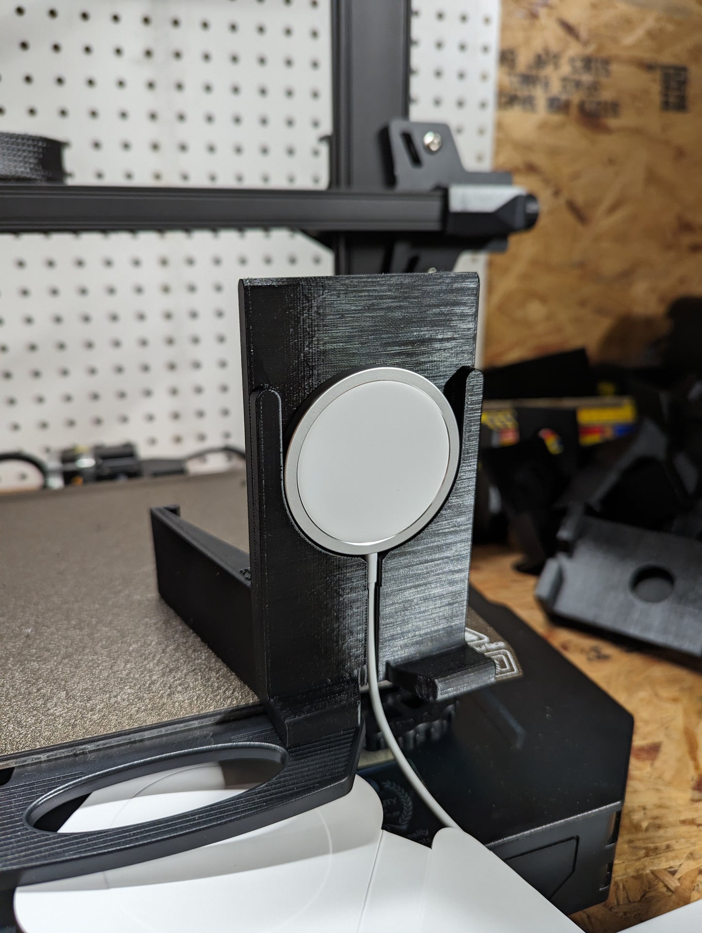 A black Mag Safe 3D printed phone mount for a Dodge Ram vehicle, showing the front side of the mount 